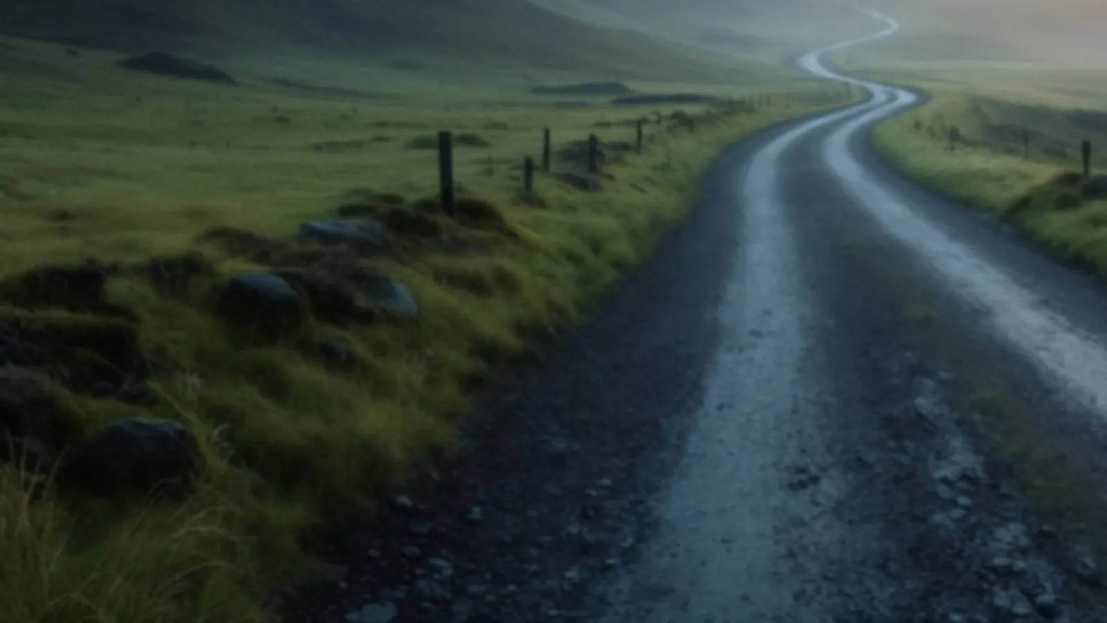 An empty winding gravel road through green moorland at sunrise, the MileCrafters view of personal cash loans online, $100 – $5,000